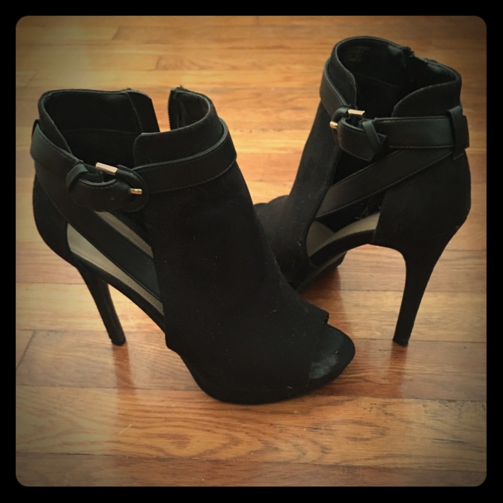 Open toed black booties...